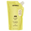 Yellow refill pouch of amika smooth over frizz-fighting treatment on a white background - Hair Care Canada