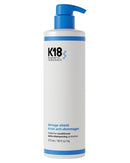 K18 hair care product bottle with blue pump on a white background - Hair Care Canada