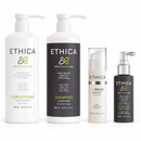 Four Ethica hair care products arranged on a white background: a large white conditioner bottle, a large white-and-black shampoo bottle, a tall white eMask treatment bottle, and a black Ageless treatment bottle with silver pump - Hair Care Canada
