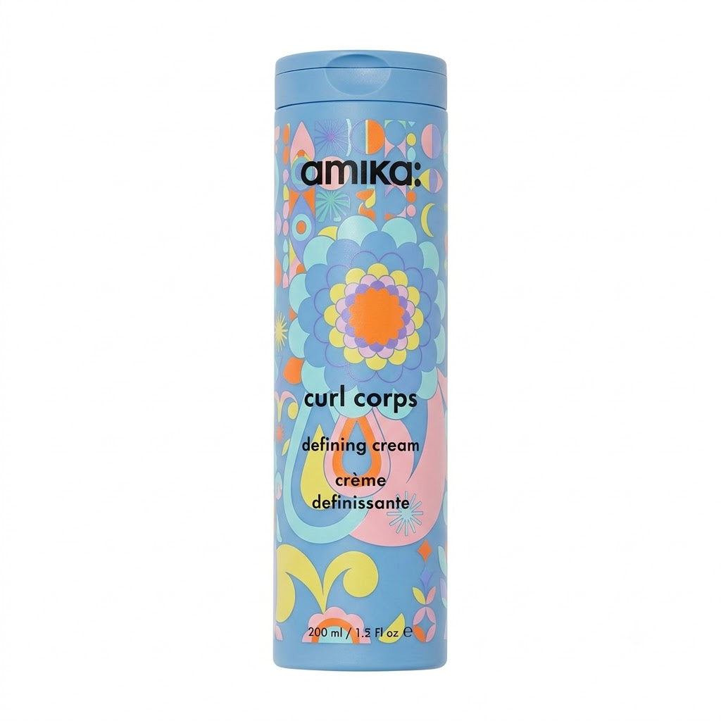 Amika Curl Corps defining cream container with colorful design on a white background - Hair Care Canada