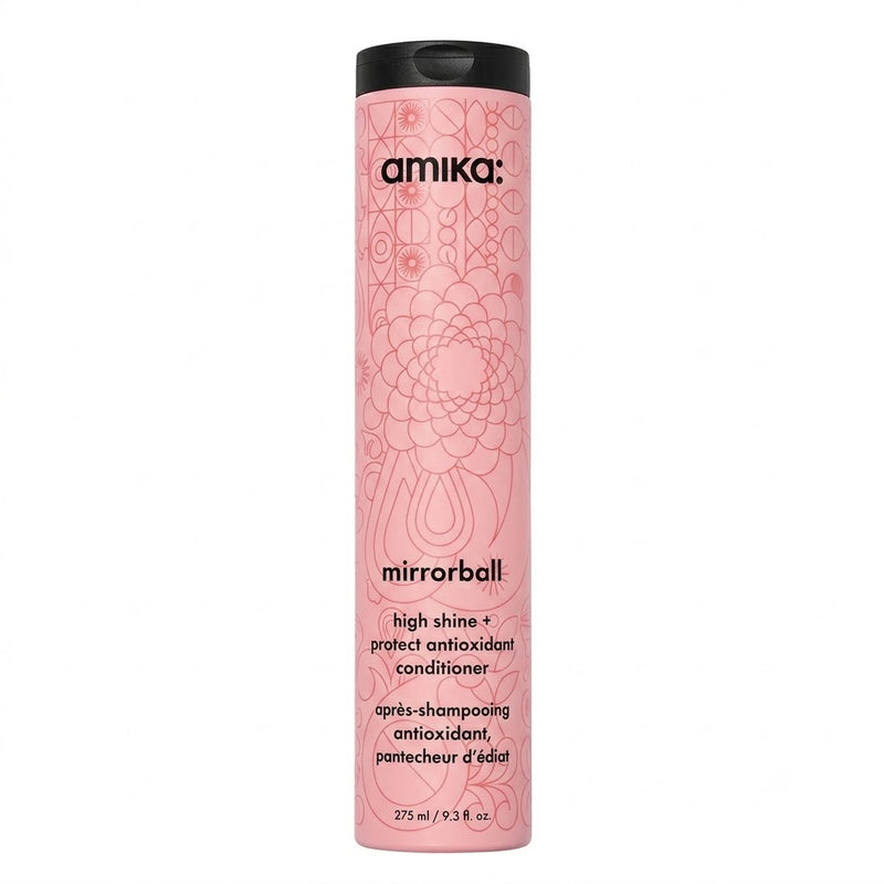 Pink bottle of amika mirrorball conditioner on a white background  Hair Care Canada