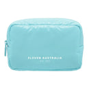 A light blue puffer-style pouch bag with a white printed logo reading 'ELEVEN AUSTRALIA est. 2011' on the front, shown against a plain white background.