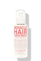 Bottle of 'Miracle Hair Treatment' by Eleven on a white background - hair Care Canada