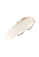 Close-up of a beige cosmetic product swatch on a white background - Hair Care Canada