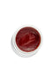 Red gel in a white container on a white background - Hair Care Canada