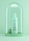 Kevin Murphy hair product under a glass dome on a light green background - Hair Care Canada 