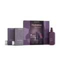 Kevin Murphy Hydration Heroes hair care set featuring a purple and gray box, two rectangular bottles, and a spray bottle on a white background.