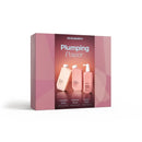 Kevin Murphy Plumping Power hair care set in a pink and dark red box, showing three bottles on the front, photographed on a white background.