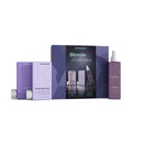 Kevin Murphy Blonde Brilliance hair care set featuring a purple and blue gift box, a blonde angel wash bottle, an argan oil bottle, and a hair oil spray bottle, all on a white background.