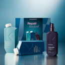 Kevin Murphy Repair Revival hair care set featuring a Repair Revival box, a teal PepiRide Wash bottle, a dark purple Young-Again spray bottle, and a blue Repair Mask box on a reflective blue surface.