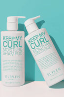 Two bottles of 'Keep My Curl' shampoo and conditioner on a light blue background - Hair Care Canada