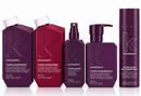 Six Kevin Murphy Young Again haircare products in a row on a white background, including wash, rinse, spray, masque, and dry conditioner bottles in deep purple and burgundy tones.