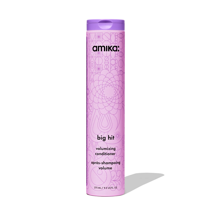 Purple bottle of amika 'big hit' volumizing conditioner on a white background  Hair Care Canada