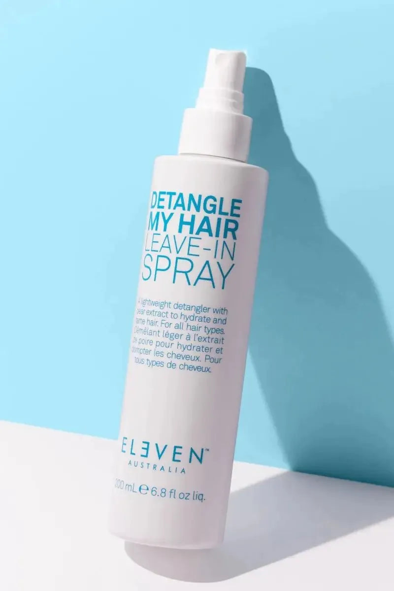 Detangle My Hair Leave-In Spray bottle on a light blue background - Hair Care Canada