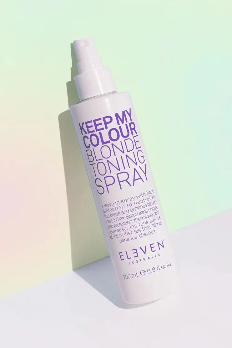 Blonde toning spray bottle on a pastel gradient background - Hair Care Canada