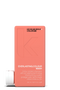 Kevin Murphy shampoo bottle with coral packaging on a white background