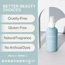 A light blue cosmetic spray bottle labeled 'bynd' stands on a white surface beside a pale blue text panel listing product benefits such as cruelty-free, gluten-free, natural fragrance, and no artificial dyes.