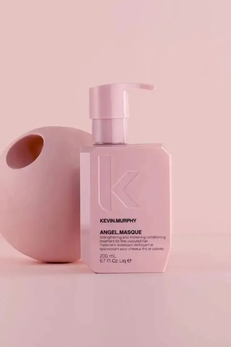Kevin Murphy Angel Masque bottle on a pink background - Hair Care Canada 
