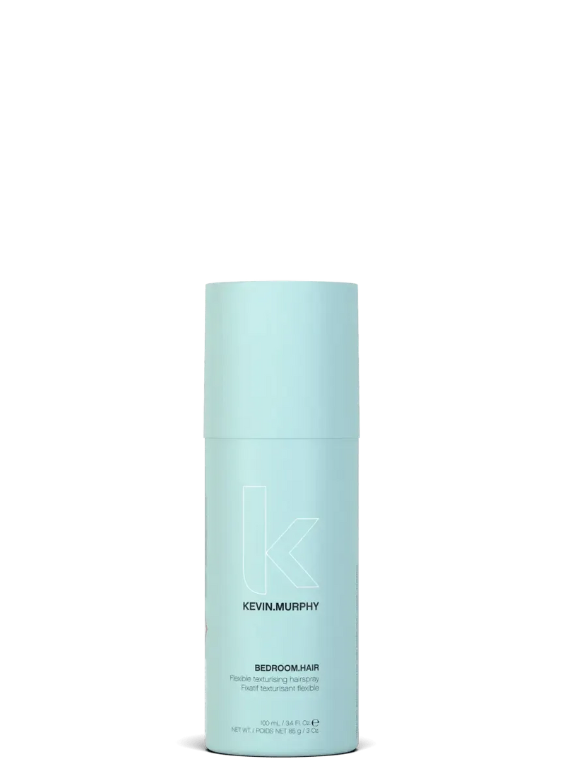 Blue hair product bottle with Kevin Murphy branding on a white - Hair Care Canada