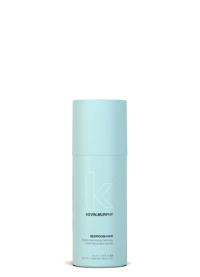 Blue hair product bottle with Kevin Murphy branding on a white - Hair Care Canada