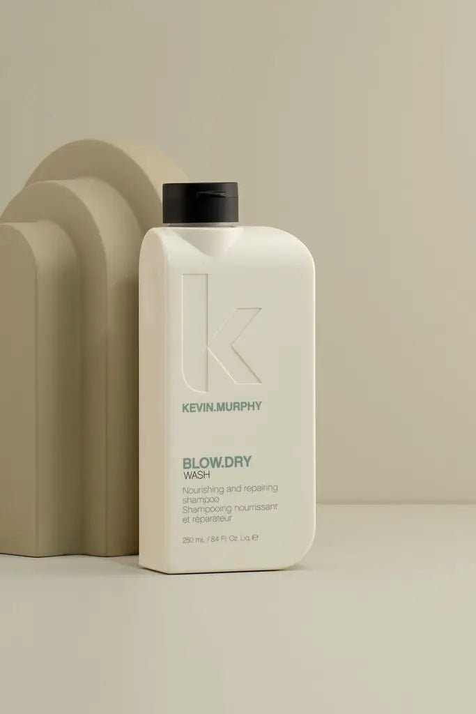 Kevin Murphy shampoo bottle on a beige background - Hair Care Canada