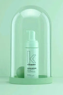 Kevin Murphy hair product under a glass dome on a light green background - Hair Care Canada 