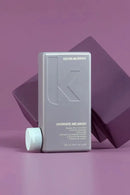 Kevin Murphy Hydrate-Me.Wash shampoo bottle on a purple background - Hair Care Canada