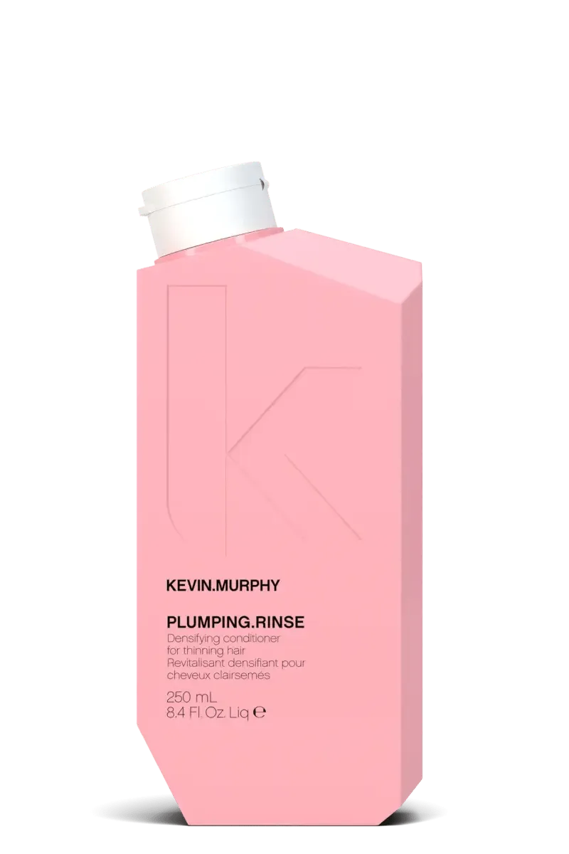 Pink bottle of Kevin Murphy Plumping Rinse on a white background - Hair Care Canada