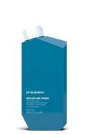 Blue bottle of Kevin Murphy Repair Me Rinse on a white background - Hair Care Canada