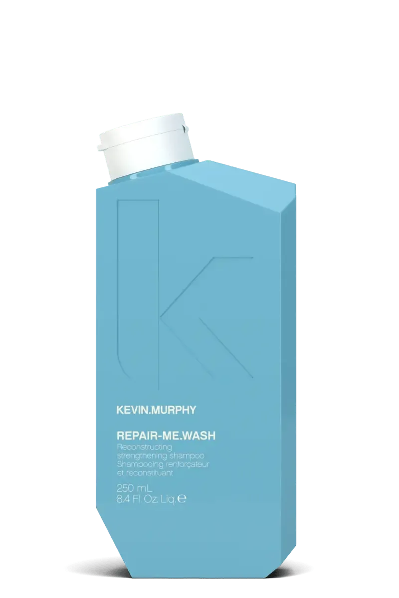 Blue bottle of Kevin Murphy Repair Me Wash on a white background - Hair Care Canada