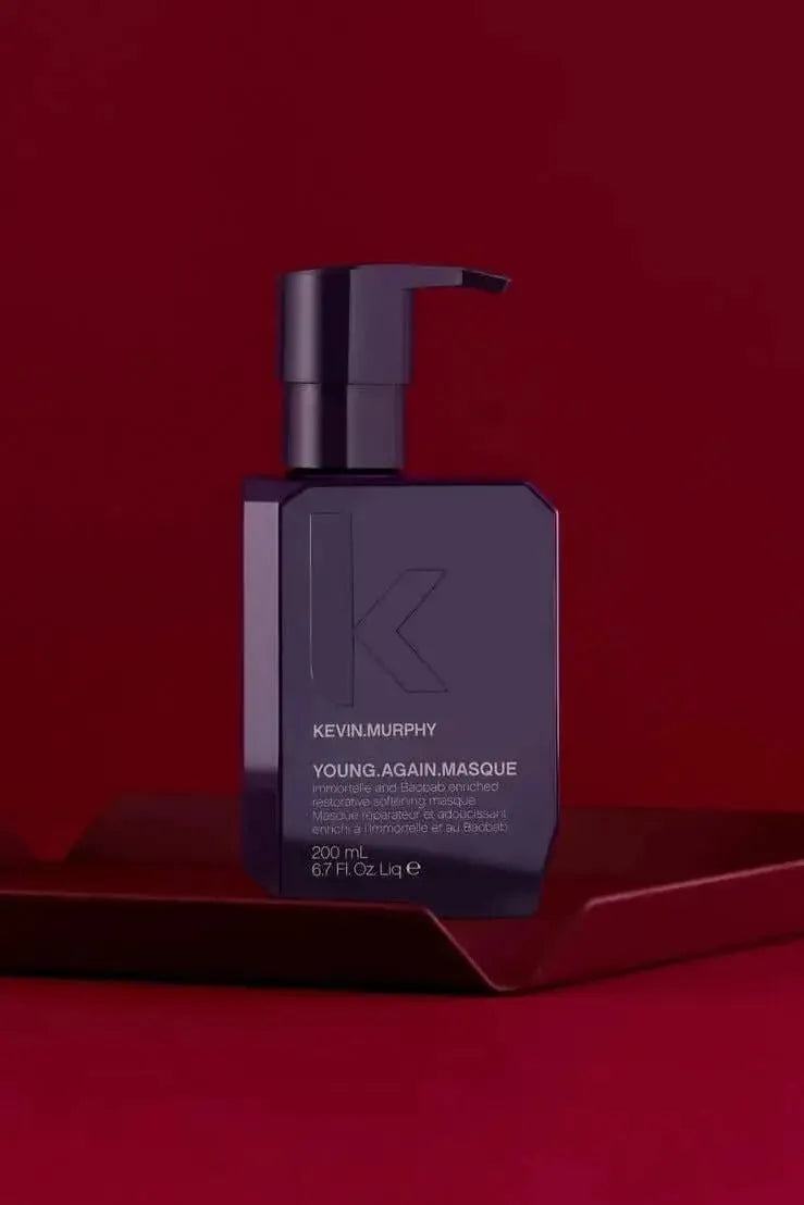 Kevin Murphy Young Again Masque bottle on a red background - Hair Care Canada