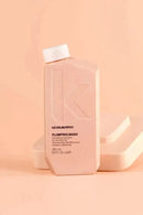 Kevin Murphy Plumping Wash bottle on a peach background - Hair Care Canada