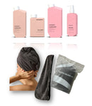 Kevin Murphy hair care products including bottles, a towel, and a pouch on a white background - Hair Care Canada