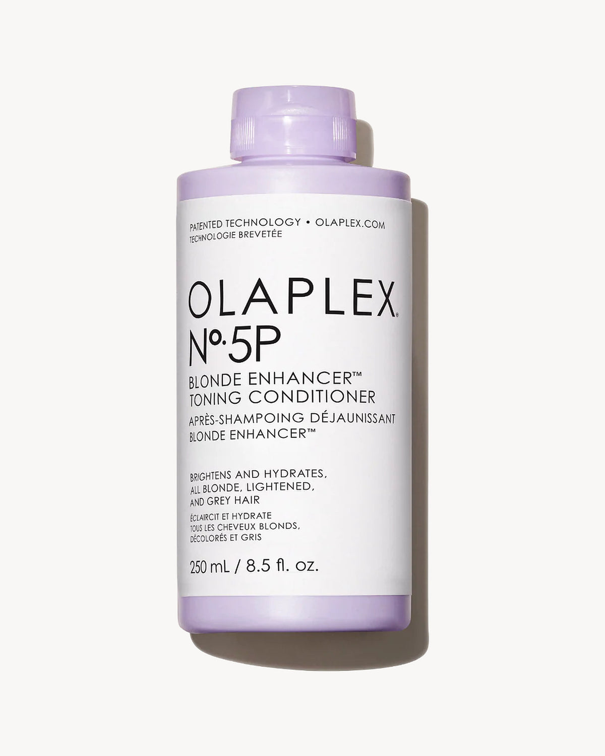 OLAPLEX No.5P Blonde Enhancer Toning Conditioner bottle on a white - Hair Care Canadabackground
