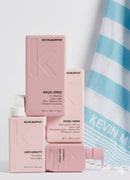Kevin Murphy hair care products with a striped towel in the background - Hair Care Canada
